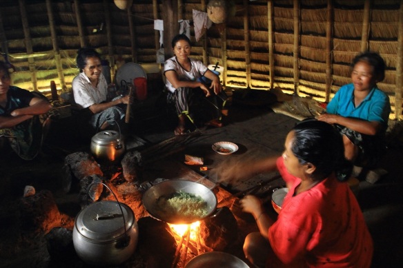 Women cooking dinner at Wae Rebo. 